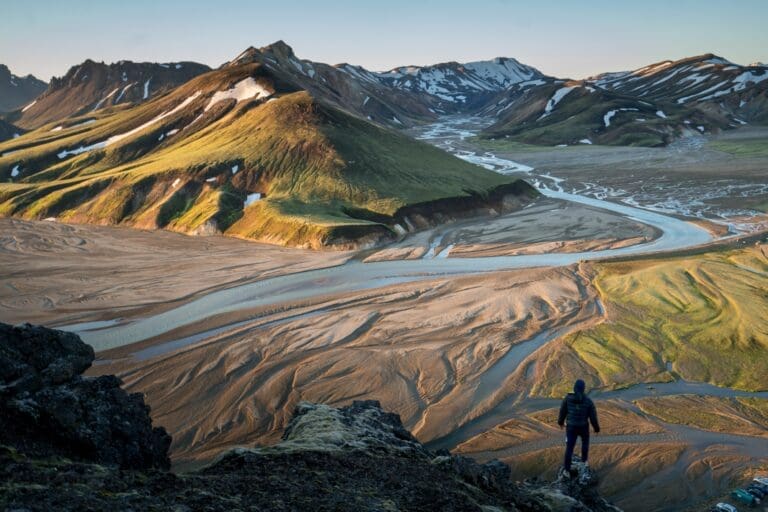 Hiker taking in the beauty of Landmannalaugar